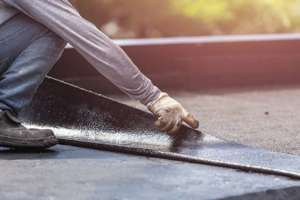 Professional Basement Waterproofing technician working in Eldorado, OH
